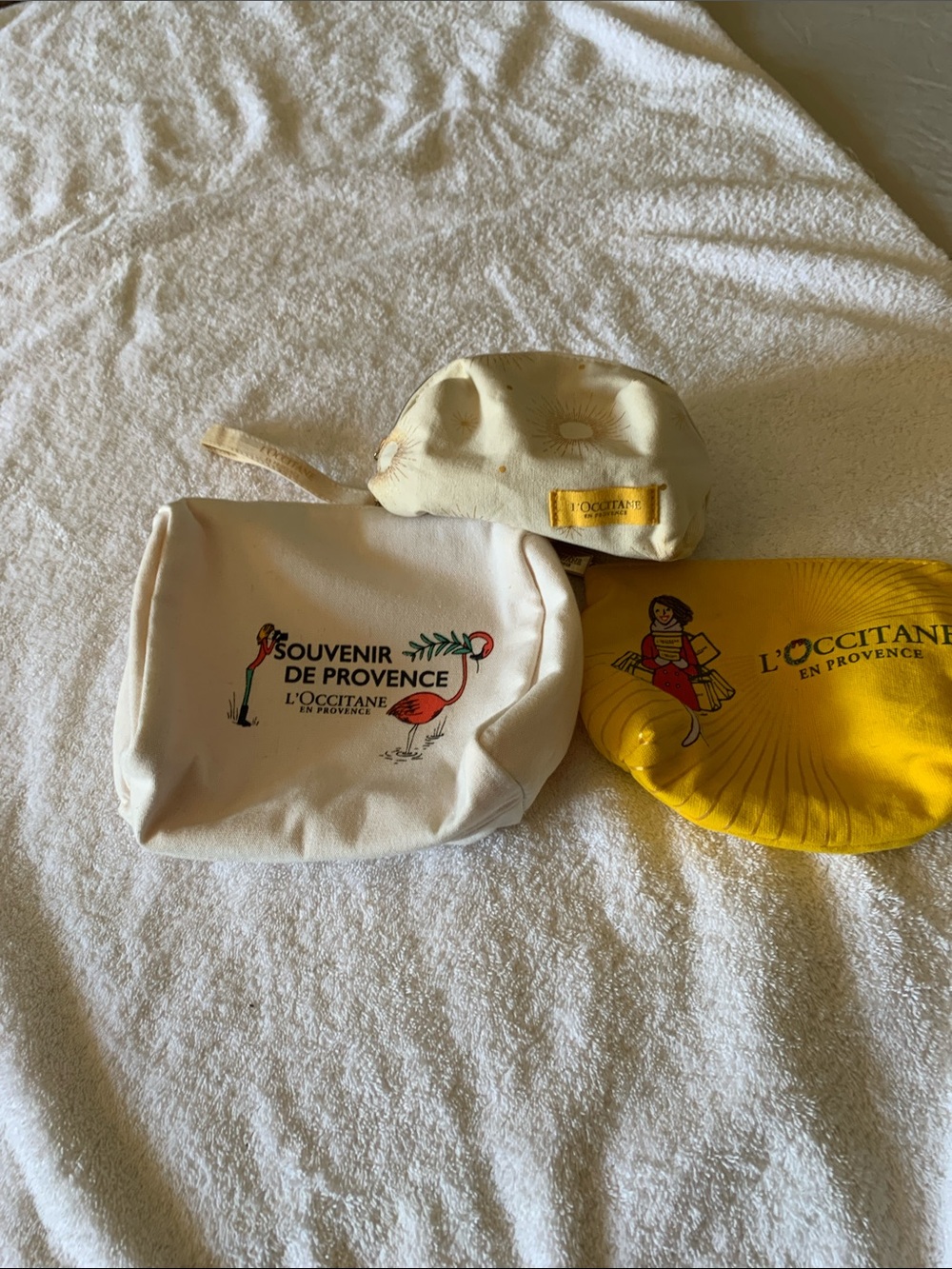 L'OCCITANE Cream and Yellow Souvenir Pouch Trio